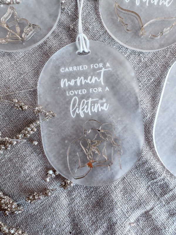 “Carried for a moment, loved for a lifetime” Oval Christmas memorial angel bauble