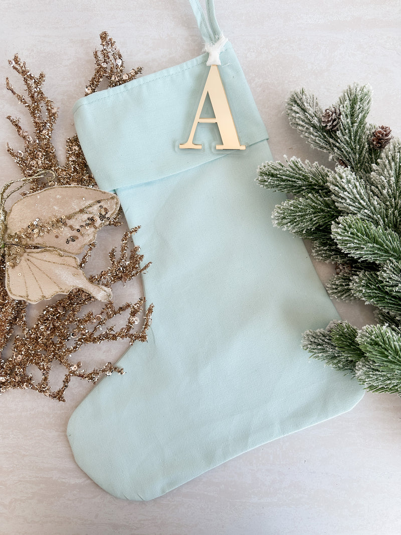 Linen Christmas stocking with initial tag - light blue