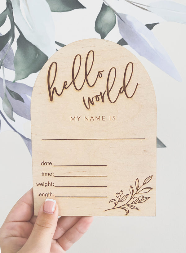 "Hello world" arch announcement plaque with olive branch