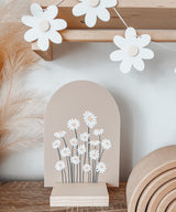 Arch plaque with printed daisy design
