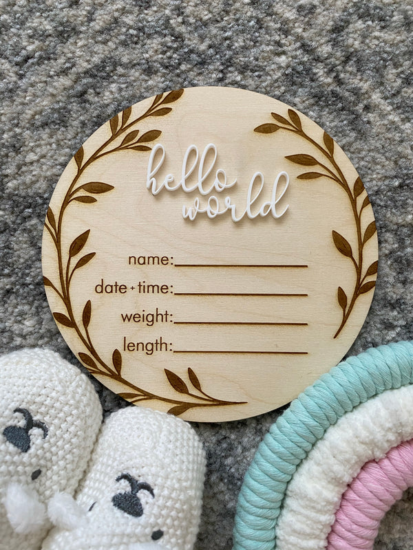 Timber baby announcement plaque with vine border