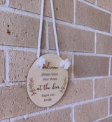 “Please leave shoes at the door” hanging plaque